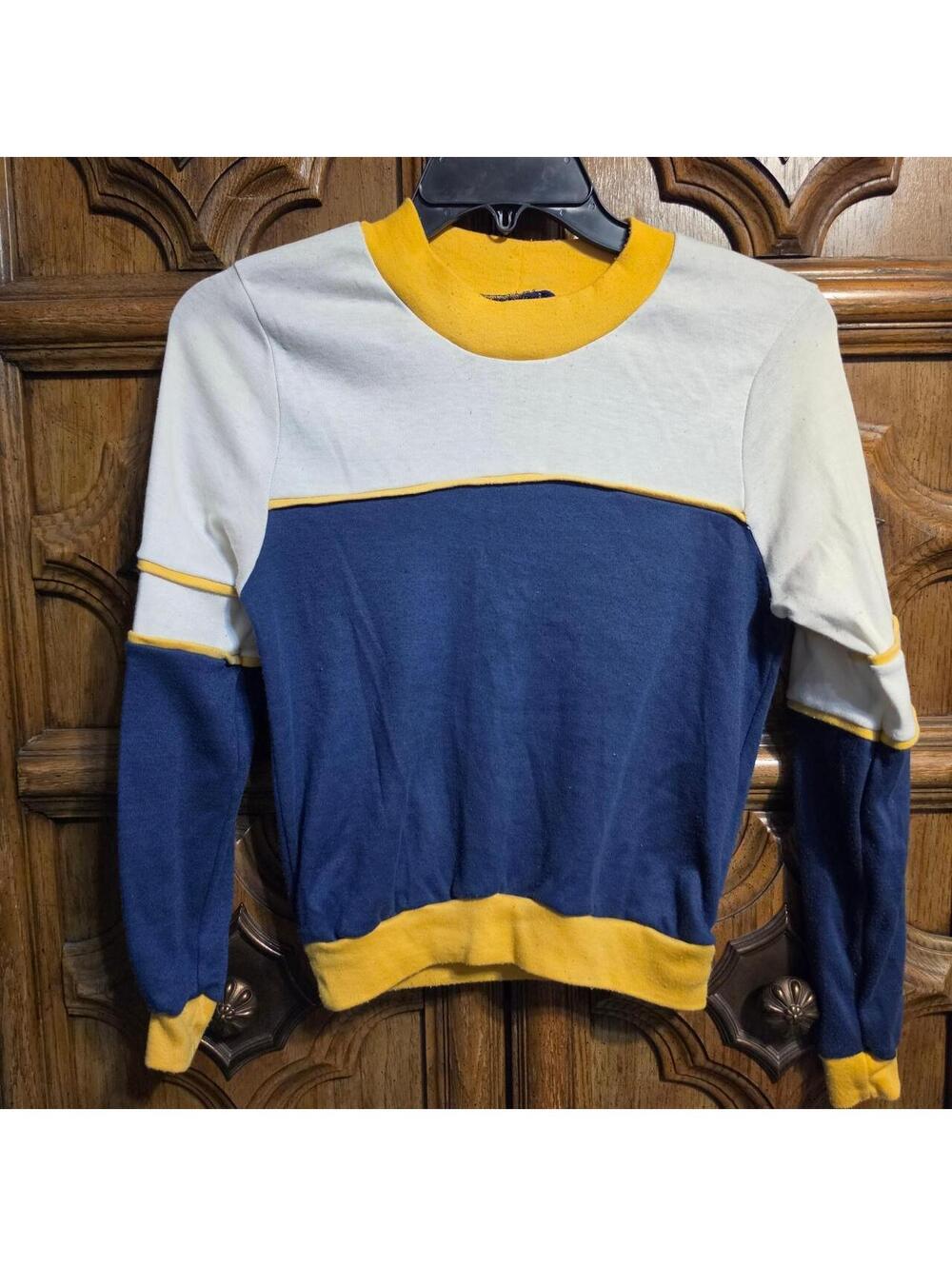 vintage blue, white, and yellow color-blocked sweater with yellow trim
